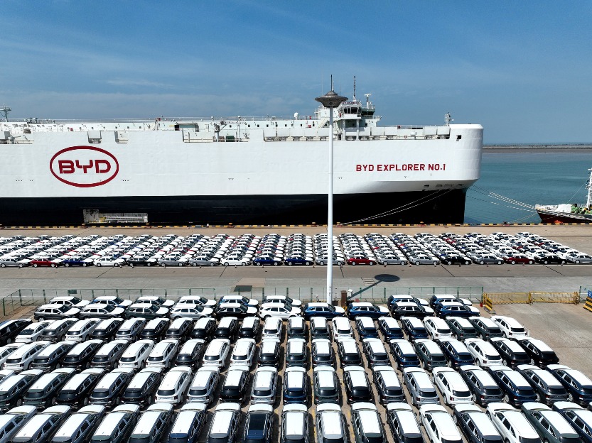 NEVs are ready to be loaded for export at a port in Lianyungang, Jiangsu Province.